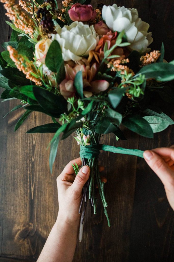 Floral tape to hold together faux bouquet for elopement