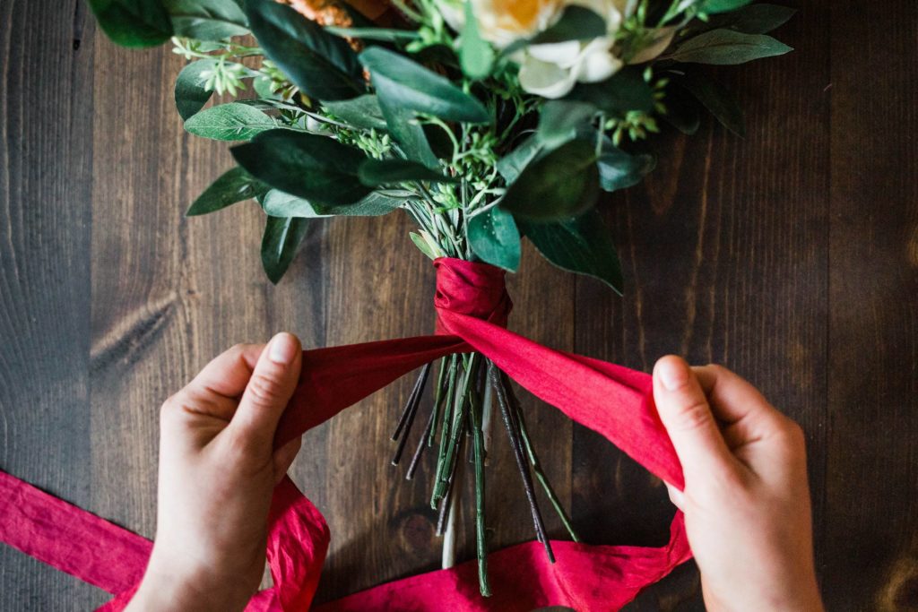 Add ribbon to faux elopement bouquet for wedding