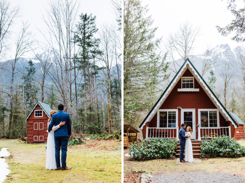 red a frame cabin wedding with couple posing in front