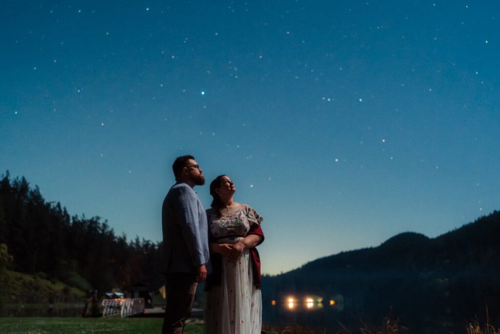 a couple stargazing during their San Juan Islands Elopement.