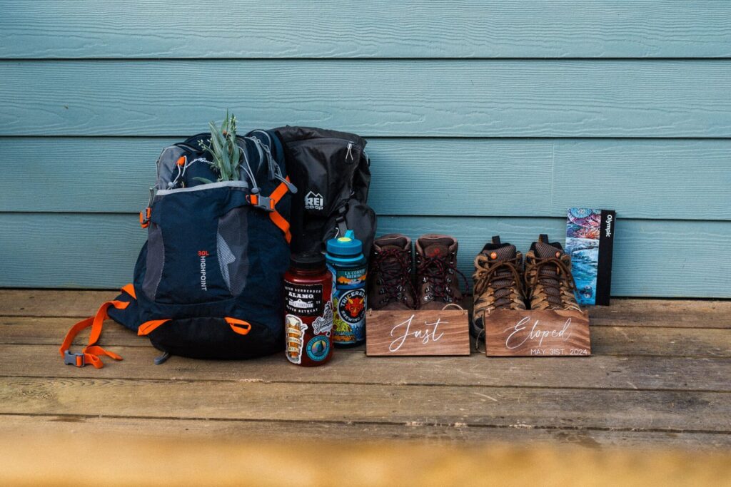 hiking gear and just eloped signs